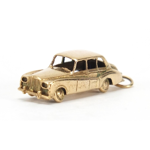 2430 - Large 9ct gold saloon car charm, 4cm in length, approximate weight 11.5g