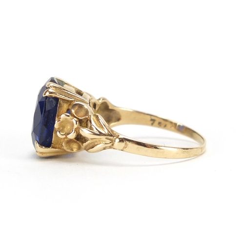 2449 - 9ct gold blue stone solitaire ring, size O, approximate weight 3.6g