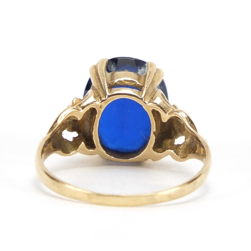 2449 - 9ct gold blue stone solitaire ring, size O, approximate weight 3.6g
