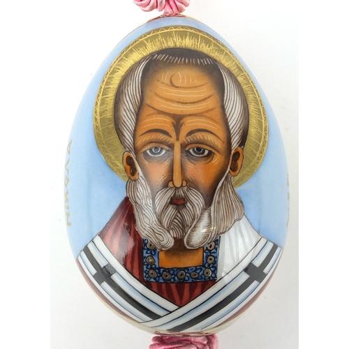 5 - Russian porcelain egg, hand painted with the priest Nikona, 10.5cm high