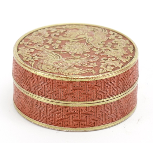 336 - Chinese porcelain iron red box and cover, gilded butterflies amongst flower heads and foliate scroll... 