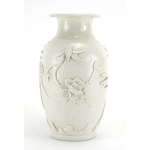 338 - Chinese porcelain Blanc de Chine vase, decorated in relief with birds of paradise amongst blossoming... 