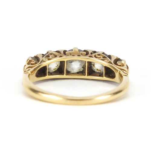 666 - 18ct gold diamond five stone ring, housed in an A J Davis & Co Plaistow tooled leather box, size M, ... 