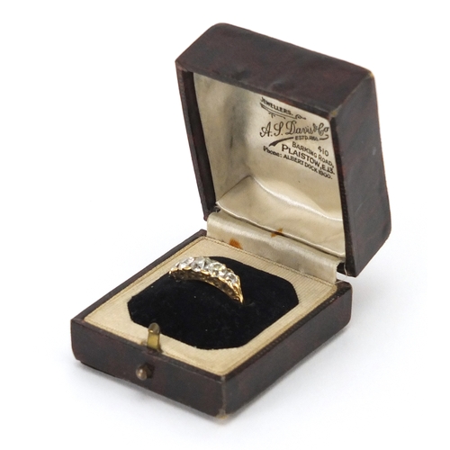 666 - 18ct gold diamond five stone ring, housed in an A J Davis & Co Plaistow tooled leather box, size M, ... 