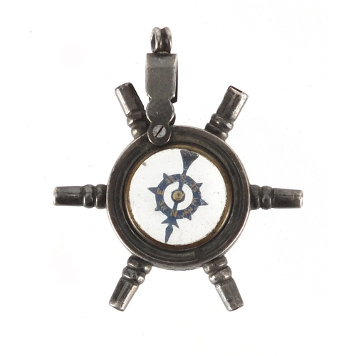 793 - Victorian silver ships wheel combination compass watch key, 3.5cm in diameter