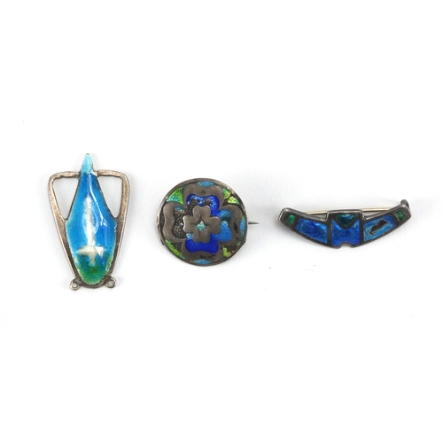 596 - Two Arts & Crafts silver and enamel brooches and a pendant, including a brooch by Charles Horner, th... 