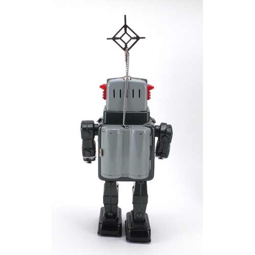132 - Japanese tin plate television spaceman robot, Battery operated with box, 27cm high