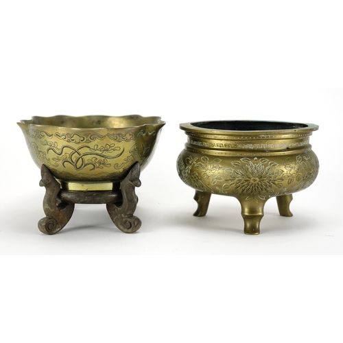 357 - Chinese bronze bowl raised on a hardwood stand, together with a three footed censer cast with phoeni... 