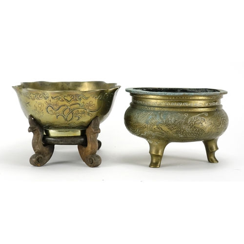 357 - Chinese bronze bowl raised on a hardwood stand, together with a three footed censer cast with phoeni... 