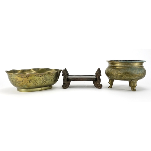 357 - Chinese bronze bowl raised on a hardwood stand, together with a three footed censer cast with phoeni... 