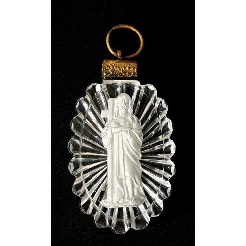 61 - Baccarat sulphide pendant of Christ holding the cross, with gilt metal mount, 12cm H x 6cm W