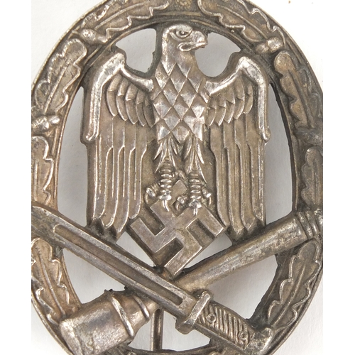 230 - Two German Military interest badges including a tank example