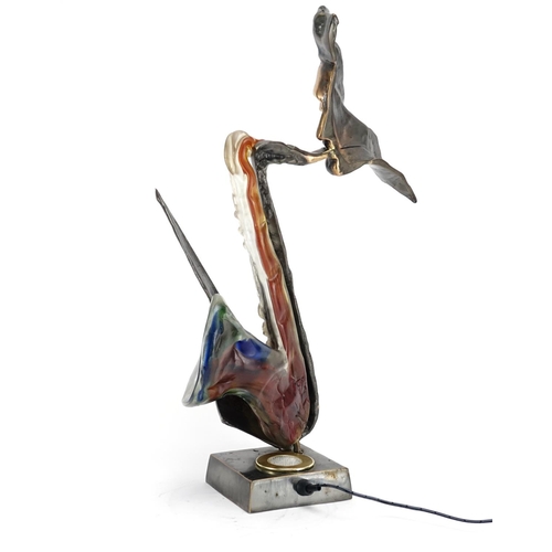 2114 - Yves Lohe, 20th century patinated bronze and glass sculptural light in the form of a man playing the... 