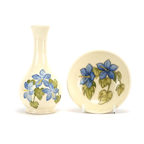 2090 - Moorcroft pottery magnolia vase and footed bowl, the largest 16cm high