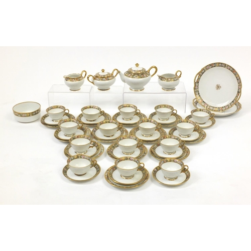 2160 - Noritake twelve place tea service, gilded and decorated with flowers including teapot, lidded sugar ... 