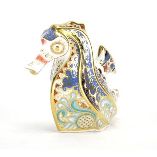 2096 - Royal Crown Derby coral seahorse paperweight with gold coloured stopper, 10.5cm high