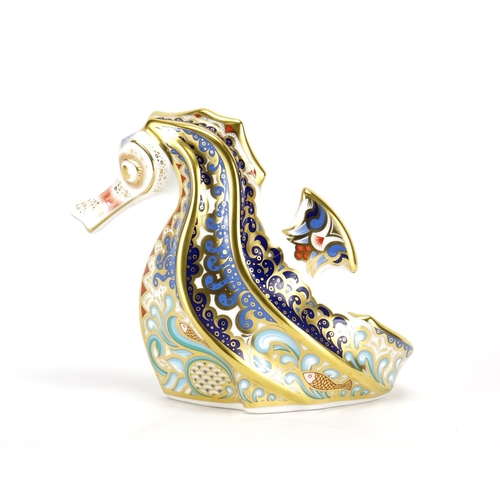 2096 - Royal Crown Derby coral seahorse paperweight with gold coloured stopper, 10.5cm high