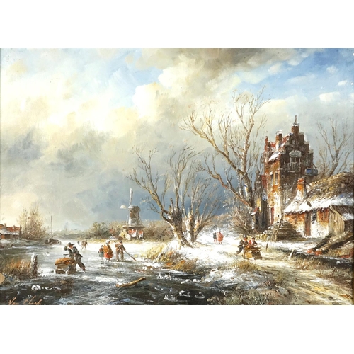 2199 - Dutch snowy winter landscape with windmill, oil on board, bearing a signature Van Cauf, framed, 39cm... 