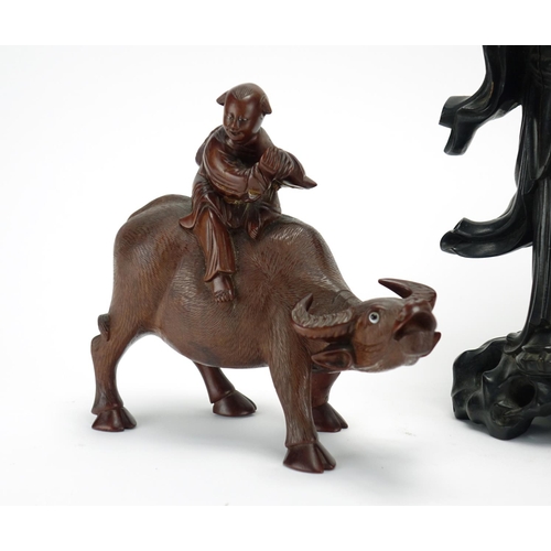 2138 - Chinese hardwood carvings including a root carving lamp base and boy on a buffalo, the largest 36cm ... 