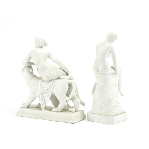 2219 - Two 19th century style Parian figures including Una and the Lion, the largest 26cm high