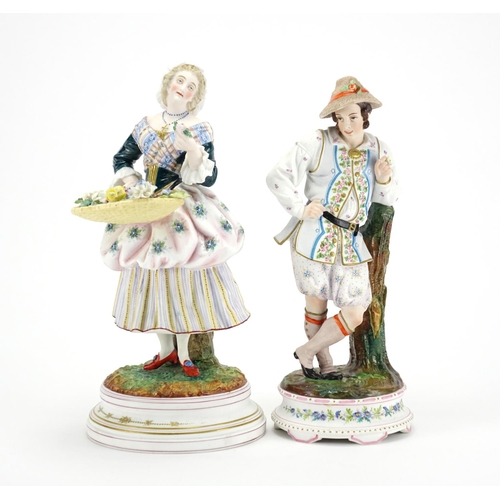 2206 - Pair of 19th century continental bisque figures including a flower seller, the largest 32cm high