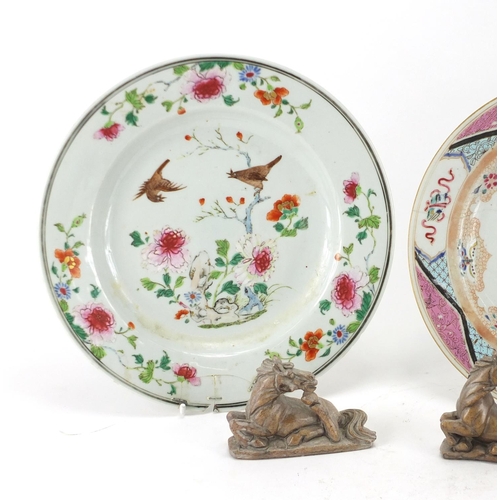 457 - Three Oriental porcelain plates, a lacquered box and cover and three carved stone horses