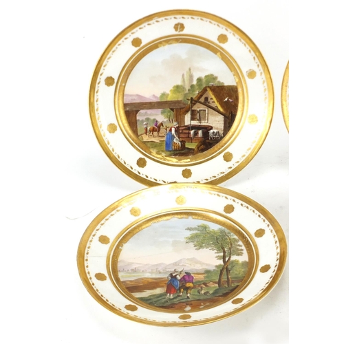 140 - Four 19th century continental porcelain plates hand painted with pastoral scenes, 21.5cm in diameter