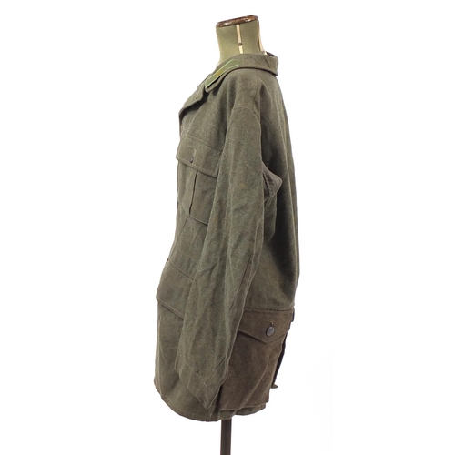 896 - German style Military interest tunic, 88cm in length