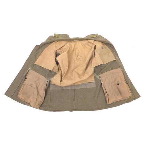 896 - German style Military interest tunic, 88cm in length