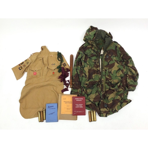 895 - Militaria including a camo tunic, turned wooden truncheon, a Centaurus mark 18 aero engine log book ... 