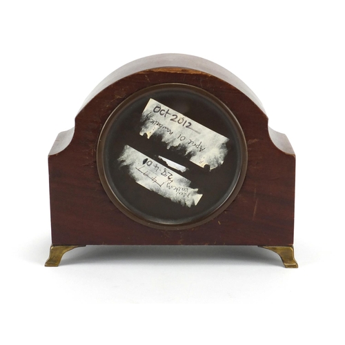 163 - Inlaid mahogany mantel clock with brass feet, 13cm high