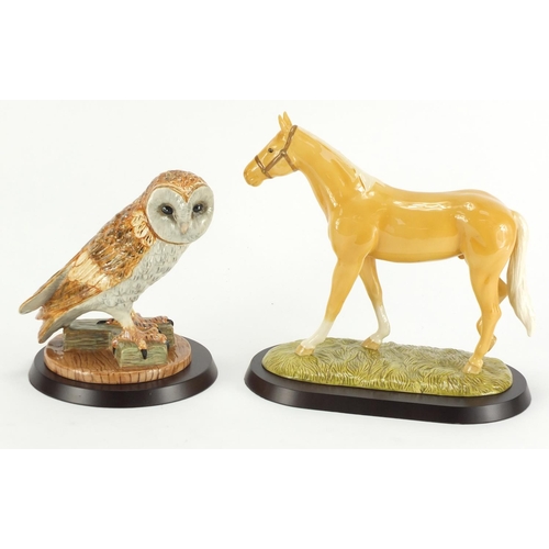 2185 - Two Royal Doulton animals with stands and boxes, Palomino RDA 31 and Barn Owl RDA 37, the largest 22... 