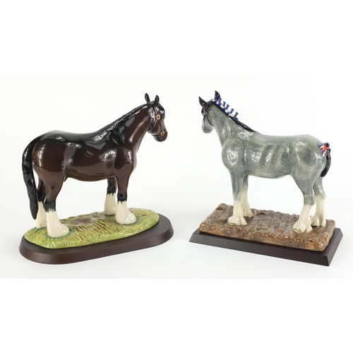 2112 - Two Royal Doulton horses with stands and boxes, Clydesdale RDA 55 and Shire RDA 26, the largest 21cm... 