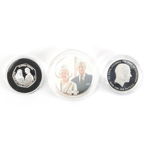 2336 - Three commemorative silver proof coins with fitted cases, Numisproof two platinum wedding Anniversar... 