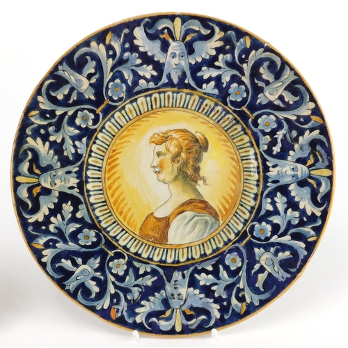 446 - Two antique Italian Cantagalli plates, each hand painted with a central portrait within classical bo... 