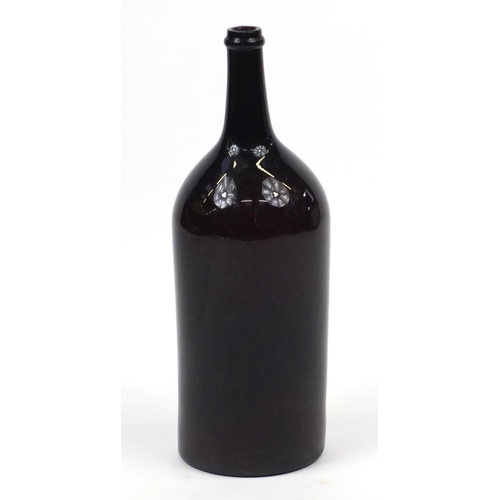 467 - Large antique brown glass bottle, 55cm high