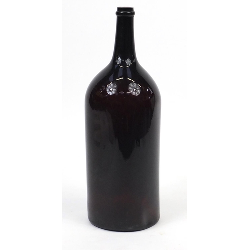 467 - Large antique brown glass bottle, 55cm high