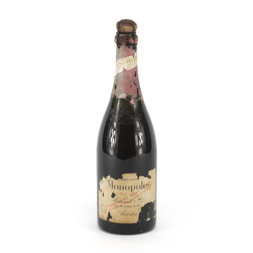 477 - Vintage bottle of Monopole red top champagne reserved for Allied Army's