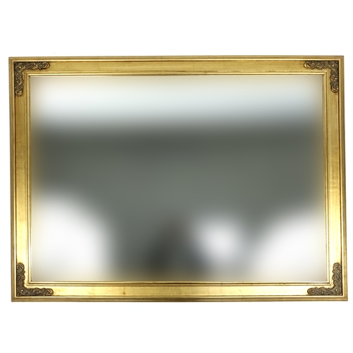 19 - Large gilt framed wall hanging mirror with bevelled glass, 142cm x 110cm