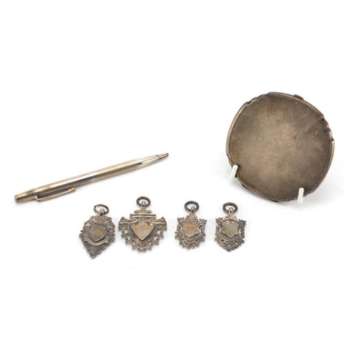 2383 - Silver objects comprising circular compact, Yard-O-Led propelling pencil and four sports jewels, app... 