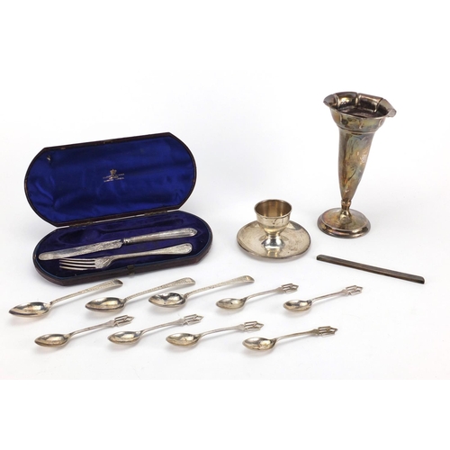 2395 - Victorian and later silver items including a bud vase, egg cup and teaspoons, the largest 17cm high,... 