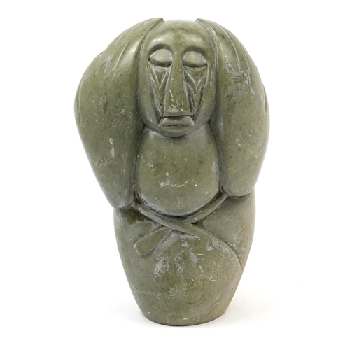 2058 - Modernist stone carving of a figure holding his hands on his head, 47cm high