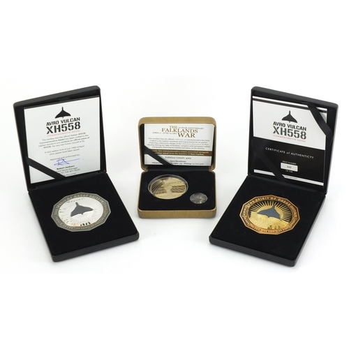 2335 - Three commemorative medals with fitted cases, two Avro Vulcan XH558 by Koin Limited and The Falkland... 