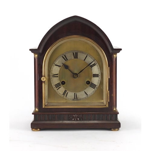 2218 - Mahogany chiming mantel clock with architectural columns, silvered chapter ring and Roman numerals, ... 