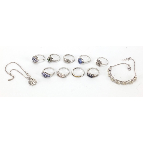 2651 - Silver jewellery set with semi precious stones, with certificates including diamond, white topaz and... 