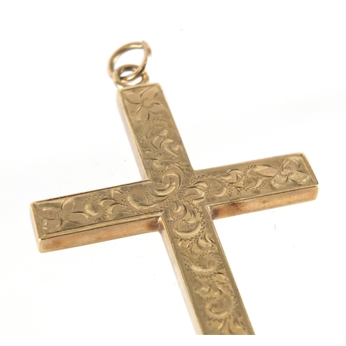 2448 - Large 9ct gold cross pendant, with engraved decoration, 6cm in length, approximate weight 5.3g