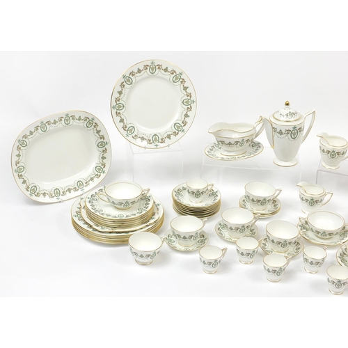2069 - Minton Adam tea and dinnerware including lidded tureens, coffee pot and platters