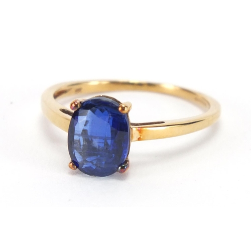 2453 - 9ct gold blue stone solitaire ring, size P, approximate weight 2.0g