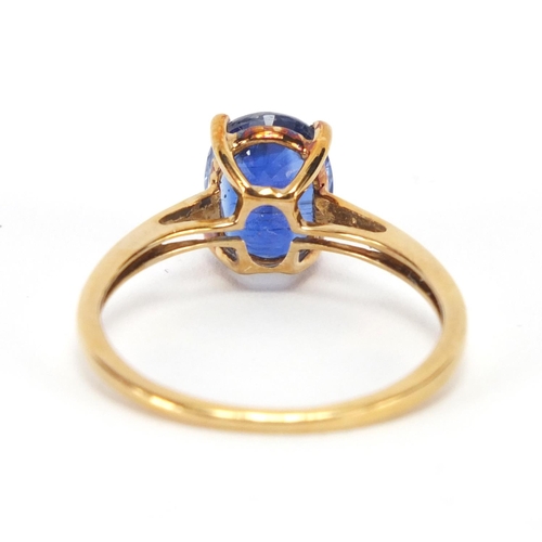2453 - 9ct gold blue stone solitaire ring, size P, approximate weight 2.0g