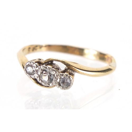 2467 - Unmarked gold white sapphire crossover ring, size L, approximate weight 1.6g
